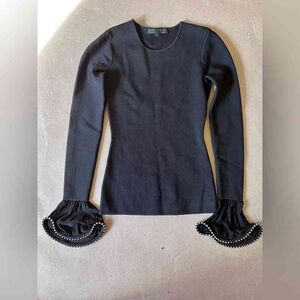 Elegant Black Long Sleeve Top with Ruffled Cuffs